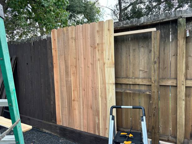 istock New cedar pickets installed on a backyard fence 1782225357