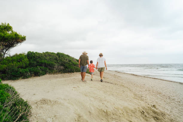 istock Walk by the sea with our grandson 1782253827