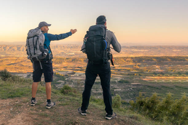 istock friends hiking in the mountains 1782274587