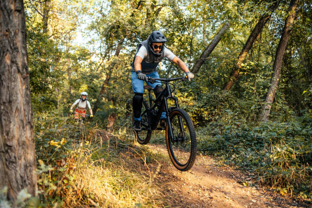 istock Man riding mountain bike on a forest trail 1782285854