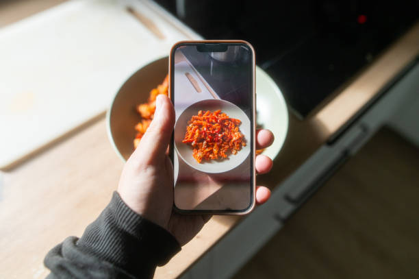 istock Taking a photo of a food dish 1782299636