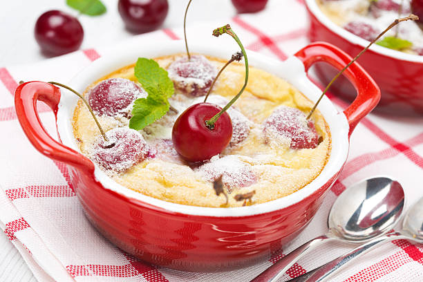 istock Clafoutis with cherries in red ramekin, close-up 178231611