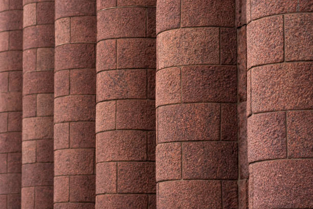 istock architectural background - massive granite engaged columns on the facade of the building 1782334295