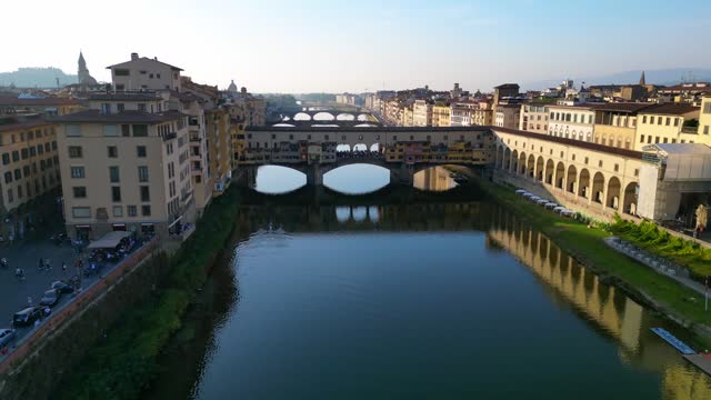 Nice aerial top view flight 
medieval bridge town Florence river Tuscany Italy. overflight flyover drone
4k cinematic