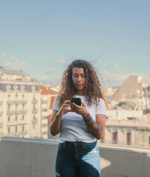 istock Woman checking her smartphone 1782384668