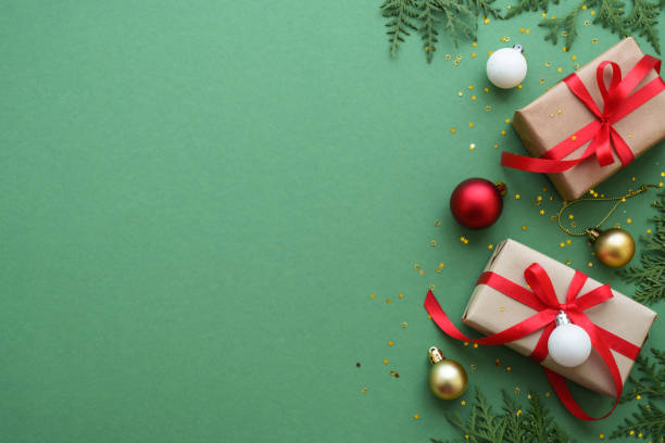 istock Christmas Present and red decorations at color background. 1782400181