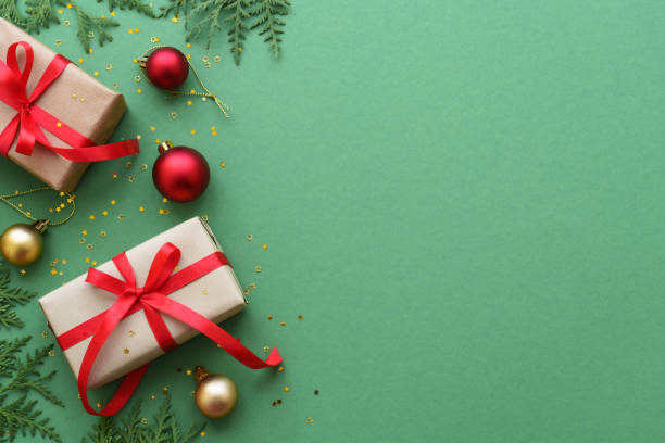 istock Christmas Present and red decorations at color background. 1782400283