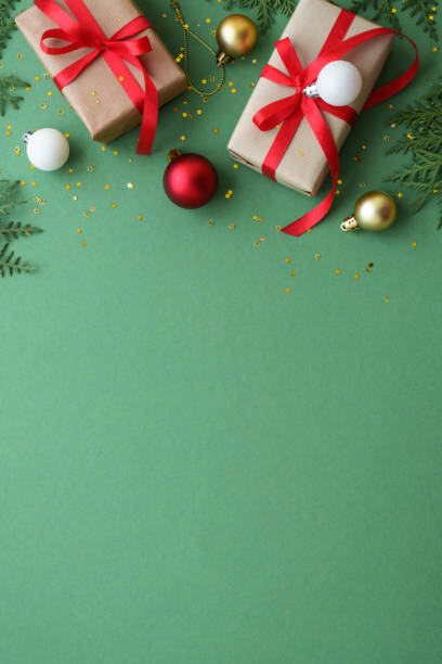 istock Christmas Present and red decorations at color background. 1782400293