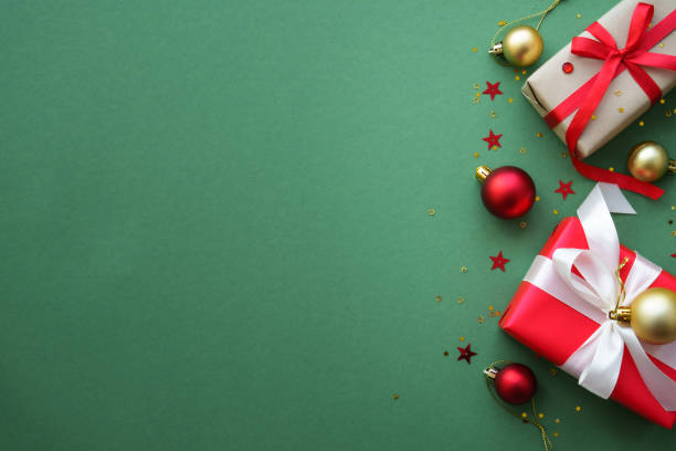istock Christmas Present and red decorations at color background. 1782400745