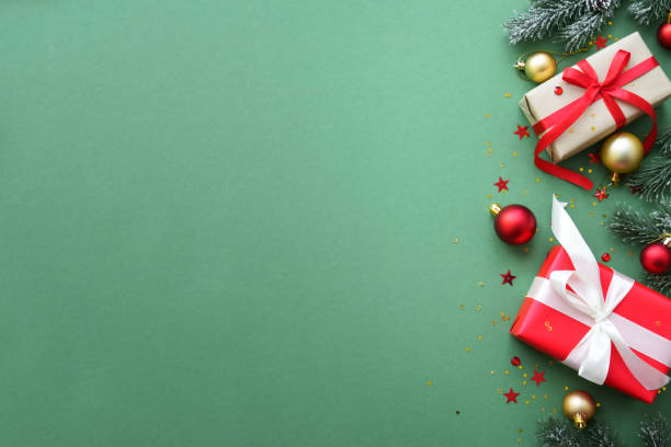 istock Christmas Present and red decorations at color background. 1782401082