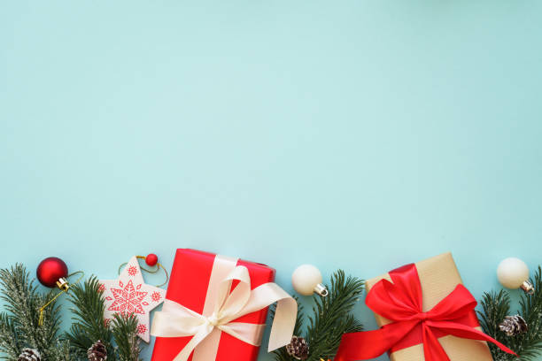 istock Christmas Present and red decorations at color background. 1782401300