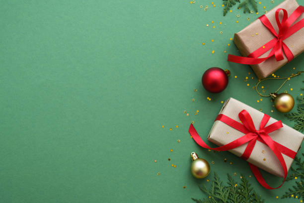 istock Christmas Present and red decorations at color background. 1782402388