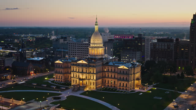 Drone Shot Slowly Pulling Back from Michigan State Capitol Building at Sunrise