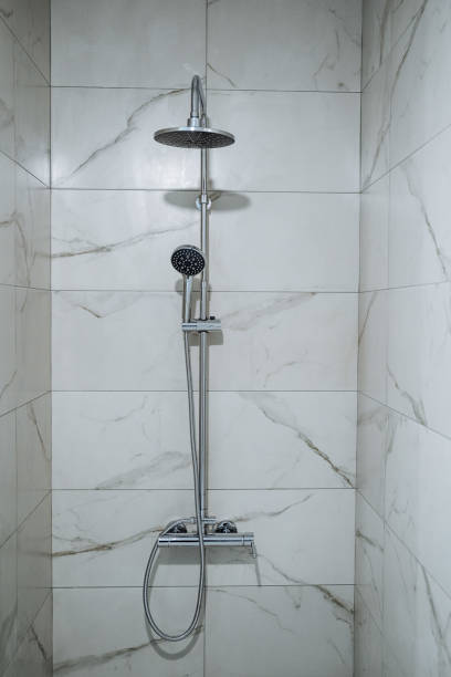 istock Shower in a marble booth. Shower system without a spill in a modern house. Contrast shower. Water treatments with comfort 1782405207