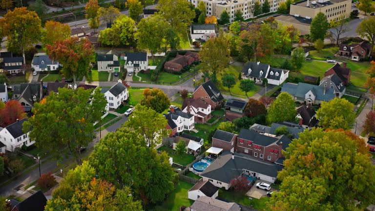 Forward Drone Flight Over Houses in Charleston on Cloudy Day