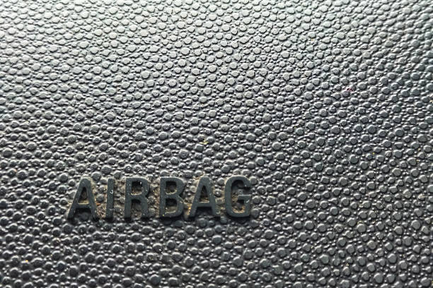 The surface texture of a car panel that has an airbag built inside to protect the driver and passenger in the event of a car collision