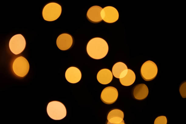 istock Yellow bokeh on a black background 1782481157