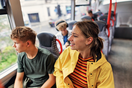 Teenage kids travelling by double decker bus in Bristol, United Kingdom\nShot with Canon R5