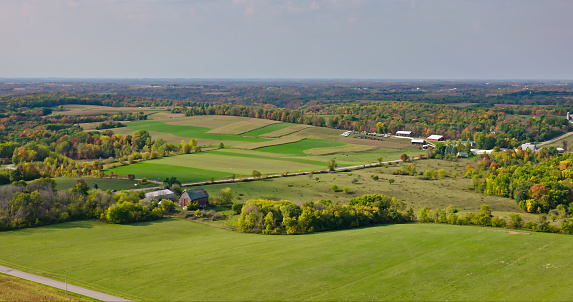An aerial still photo of luscious fields and greenery in Hillsboro, Wisconsin, on an overcast, fall day.