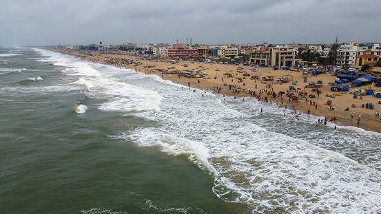 Aerial view of a crowded beach in India, Puri, Orissa.