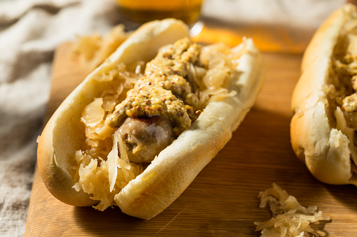 Homemade German Bratwurst Sandwich with Sauerkraut and Mustard