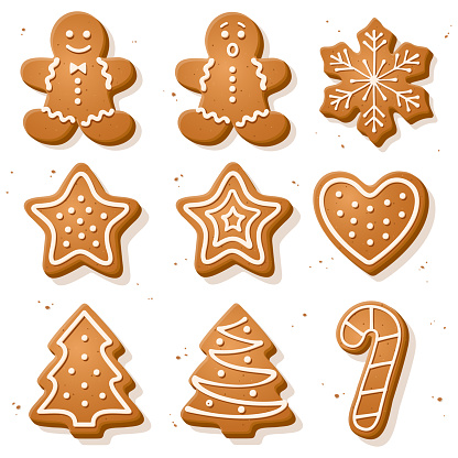 Christmas gingerbread cookies in the shape of a star, candies, snowflakes and Christmas tree