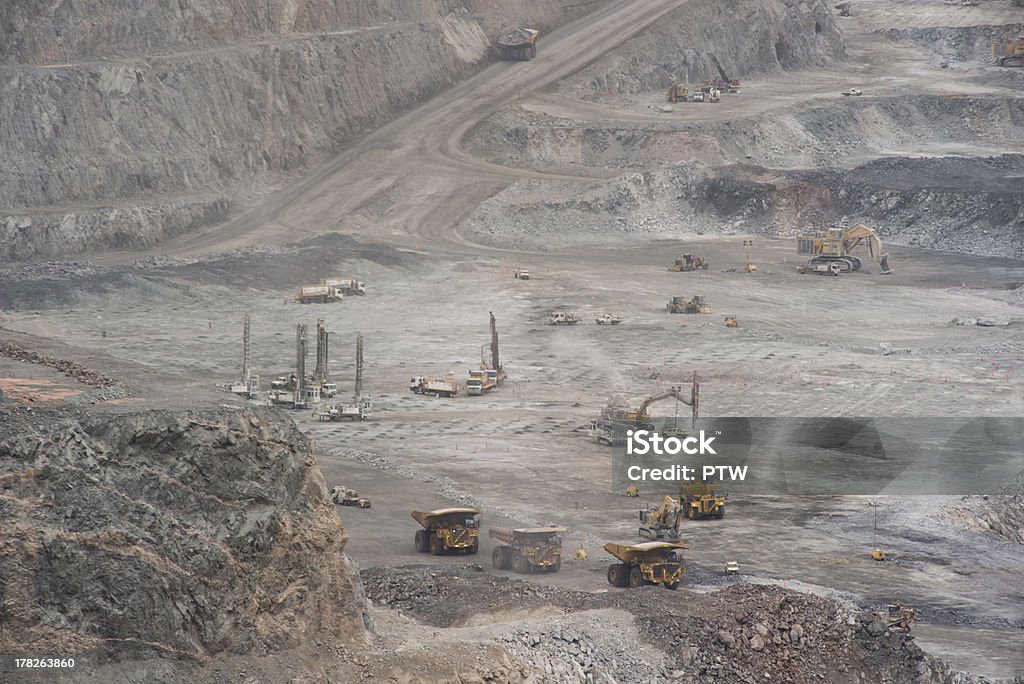 Superpit Trucks Mining Trucks working in the Superpit which  is located in Kalgoorlie in Western Australia. Australasia Stock Photo