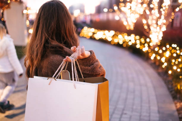 Holding shopping bags