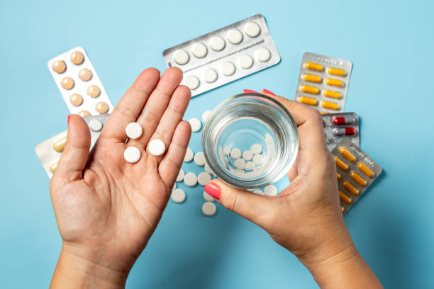 istock Hand Holding Colorful Pills 1782744958