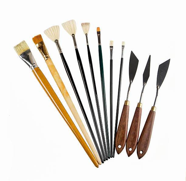 istock close up of paint brushes on white 178276117