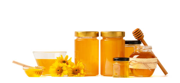 istock Honey in a jars and bowls on a white background. 1782766350