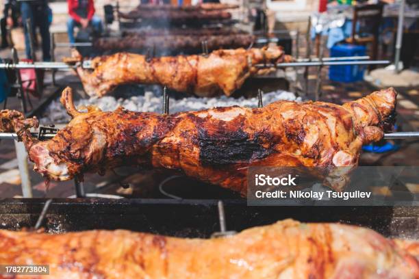 Easter In Greece Process Of Cooking Traditional Greek Easter Dish Souvla Grilled Lamb Sheep And Goat Bbq Grilling Over Charcoal In The Streets Of Athens Greece Stock Photo - Download Image Now
