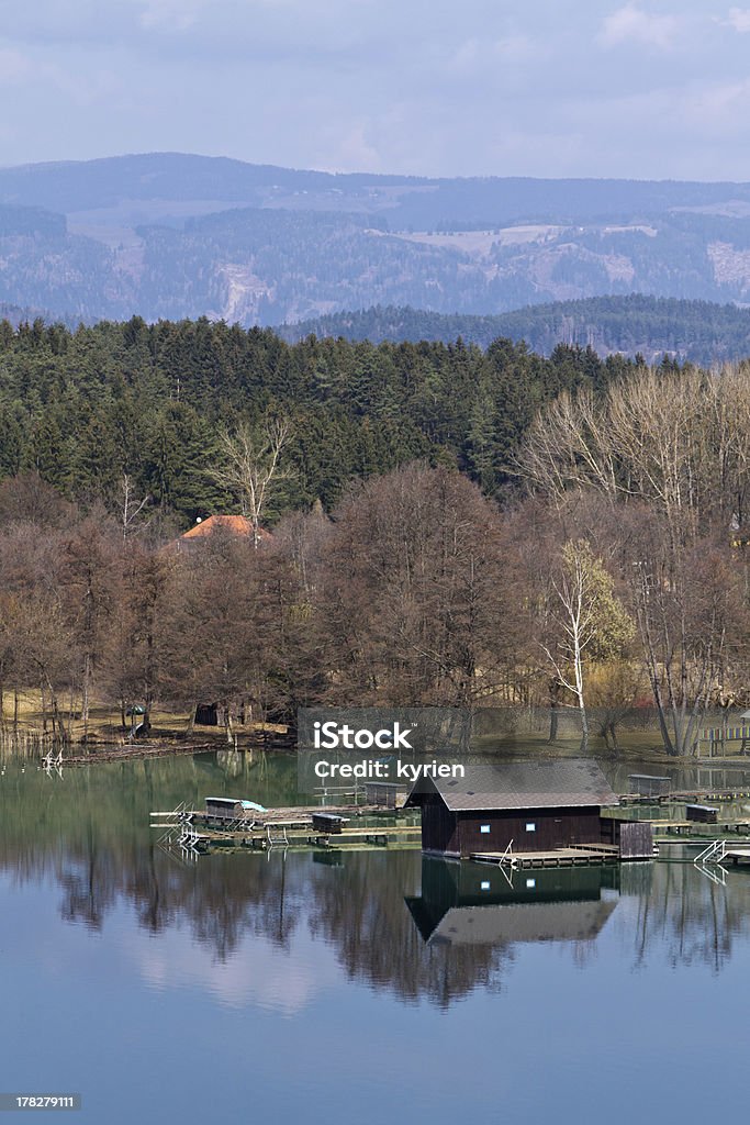 Wooden hut on a lake "A wooden hut on lake Klopein in carinthia, Austria" Austria Stock Photo