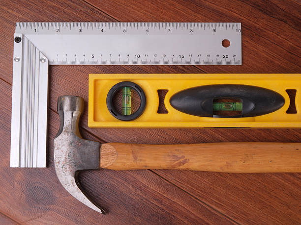 istock Hammer and Spirit level on a floor 178279369