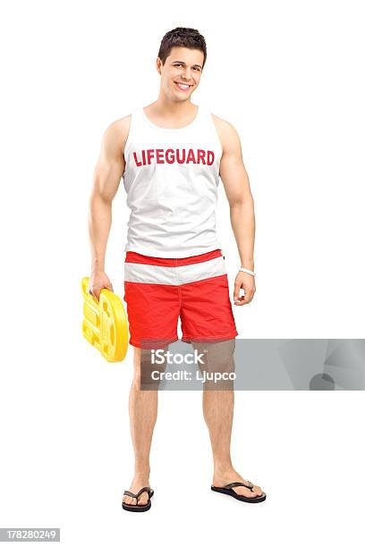 Smiling Lifeguard On Duty Posing Stock Photo - Download Image Now - Lifeguard, Cut Out, Men