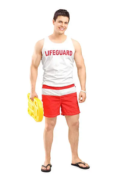Full length portrait of a smiling lifeguard on duty posing isolated on white background