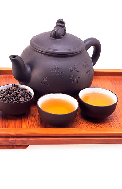 istock chinese green tea clay pot and cups 178280490