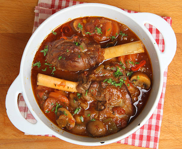 Braised Lamb Shanks in Casserole Dish Braised lamb shanks in casserole dish braised stock pictures, royalty-free photos & images