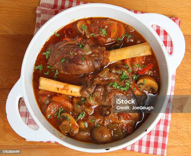 Braised Lamb Shanks In Casserole Dish Stock Photo - Download Image Now - Lamb - Meat, Shank, Braised