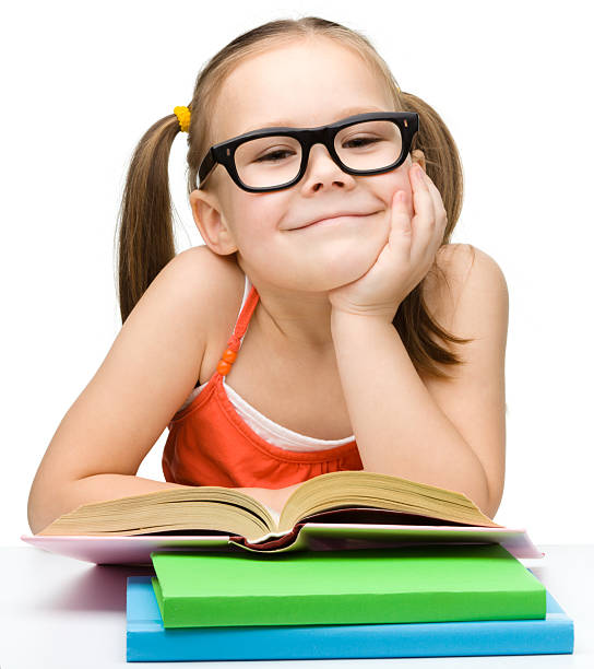 istock Cute little girl is reading book 178280693