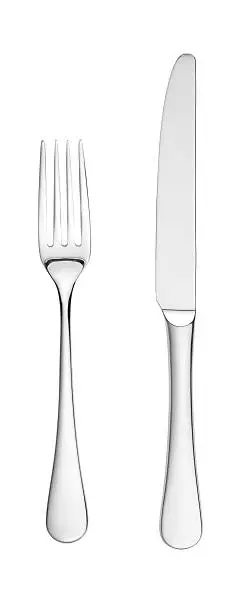 an overhead shot of a chrome silver knife and fork isolated on white with paths