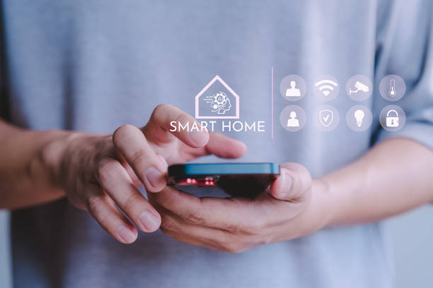 istock Adult man control technology AI smart home devices using a mobile phone with launched application. Internet of Things of smart home automation apps concept. 1782834059