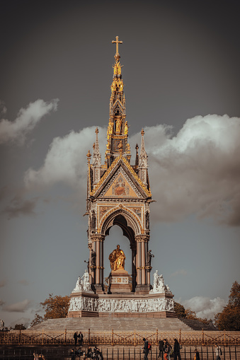 London, UK - Oct 24, 2023 - Exterior view of The Albert Memorial is in Kensington Gardens. Gothic Memorial to Prince Albert from Queen Victoria, Is a popular travel destination, Iconic, Space for text, Selective focus.