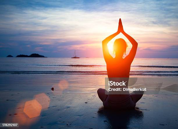 Silhouette Young Woman Practicing Yoga Stock Photo - Download Image Now - Abstract, Activity, Adult