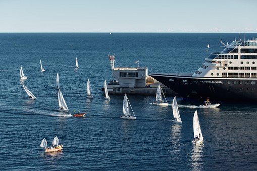Monaco, Monte Carlo, 13 November 2022: A lot of sail boats and yachts in the sea went on a sailing trip near port Hercules, sail regatta, race. High quality photo