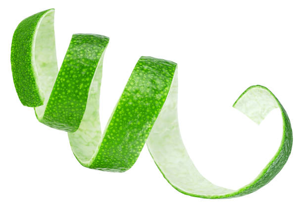 istock Fresh lime fruit peel isolated on a white background. Curly lime twist. 1782959851