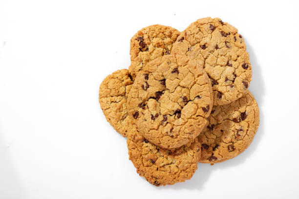 istock Pile of Chocolate Chip Cookies on White Surface 1782966636