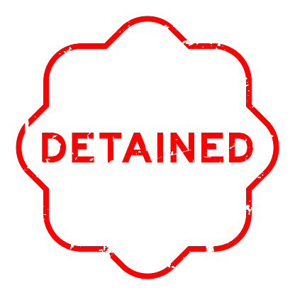 Grunge red word detained rubber seal stamp on wthie background