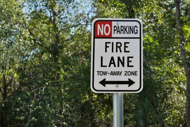 istock Fire Lane and no parking sign closeup isolated. 1782999870