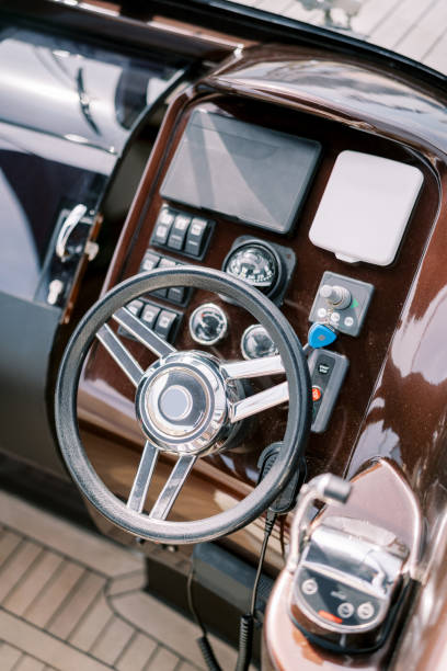 istock Steering wheel and control panel of a modern motor yacht. Top view 1783040194